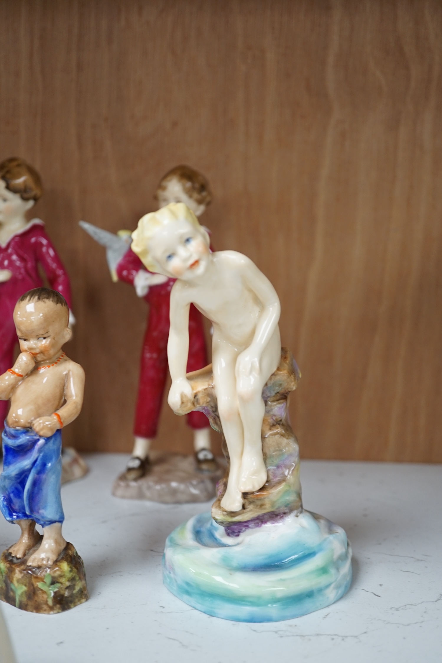 Eight various Royal Worcester F.G. Doughty figures including Happy Boy, Water Baby, Mischief, Parakeet, etc. Condition - good